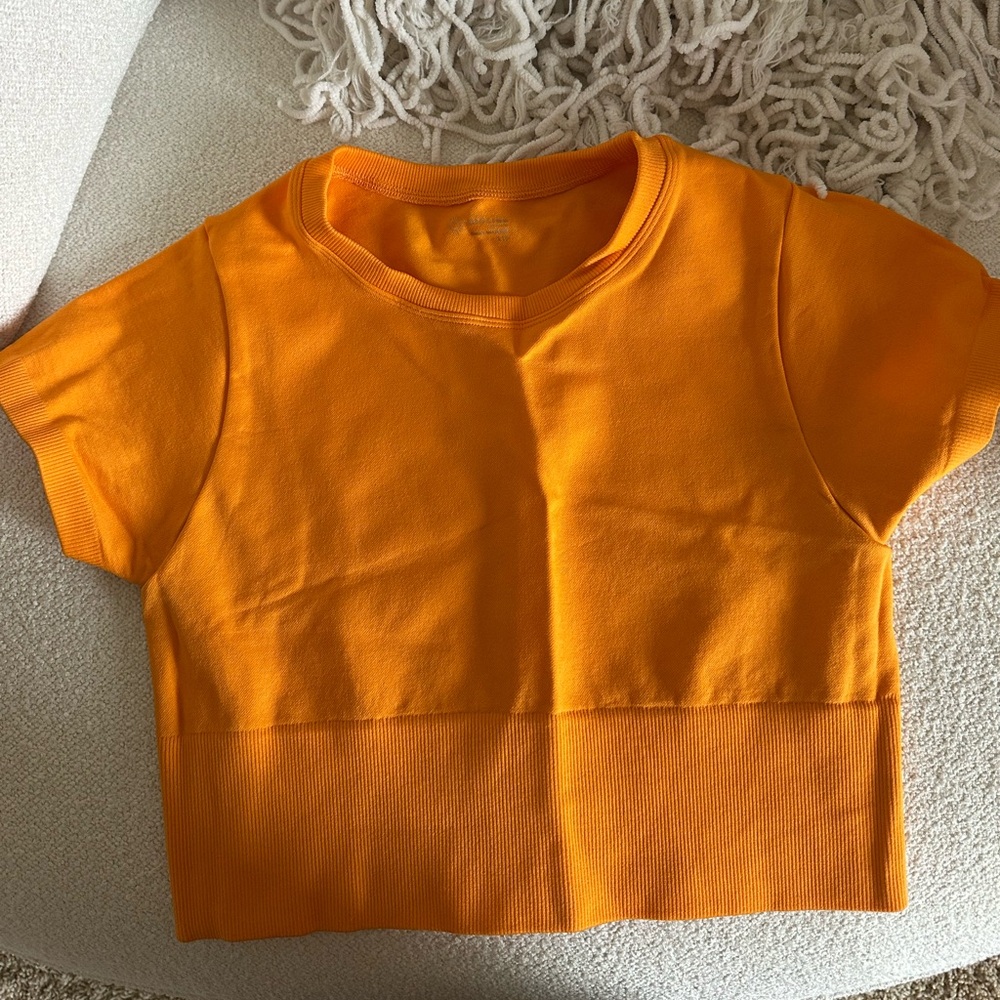 Woman’s Orange Aerie Offline Workout Top